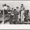 Spectators at 4-H Club fair at Cimarron, Kansas. The 4-H Club fairs have taken the place of the defunct county fairs in Kansas