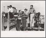 Spectators at 4-H Club fair at Cimarron, Kansas. The 4-H Club fairs have taken the place of the defunct county fairs in Kansas