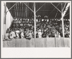 Spectators in the grandstand at 4-H club fair, Cimarron, Kansas