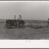 Tractor-drawn floater on Gray County farm, Kansas
