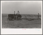 One of the Davidson brothers who own a cooperative well made possible by FSA (Farm Security Administration) loan, Gray County, Kansas