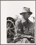 One of the Davidson brothers who own a cooperative well made possible by FSA (Farm Security Administration) loan, Gray County, Kansas