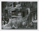 Cast scene on Catfish Row set designed by Sergei Soudeikine in the stage production Porgy and Bess