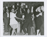 Couples dancing to the music of the Erskine Hawkins band