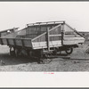 Hay wagons on farm in Sheridan County, Kansas