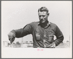Roustabout in the ditch-digging crew. Notice the sweated shirt. Seminole oil field, Oklahoma