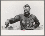 Roustabout in the ditch-digging crew. Notice the sweated shirt. Seminole oil field, Oklahoma