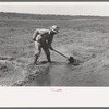 Mr. Johnson, F.S.A. client with part interest in cooperative well irrigating his fields near Syracuse, Kansas