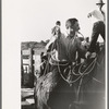 Contestant in goat-roping contest at Bean Day rodeo, Wagon Mound, N.M