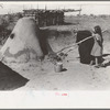 General view of oven for bread baking on Spanish-American farm in Taos, N.M