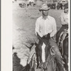 Cowboy on horse, Bean Day Rodeo, Wagon Mound, N.M