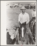 Cowboy on horse, Bean Day Rodeo, Wagon Mound, N.M