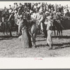 Cowboys talking, Bean Day rodeo, Wagon Mound, N.M