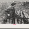 Farmer sawing wood near Bradford, Vermont