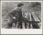Farmer sawing wood near Bradford, Vermont