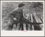 Farmer sawing wood near Bradford, Vermont