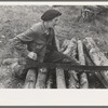 Farmer sawing wood near Bradford, Vermont