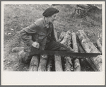 Farmer sawing wood near Bradford, Vermont
