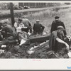 Railroad workers eating lunch along the railroad tracks, Windsor Locks, Conn