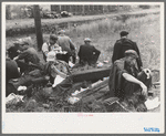 Railroad workers eating lunch along the railroad tracks, Windsor Locks, Conn