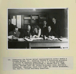 Commission for Polish Relief representatives Arthur Gamble & Columba Murray, Jr., checking records & receipting procedure in Office of District Committee No. 1 of Polish Self-Help Committee¿