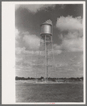 Water tower at migrant camp under construction at Sinton, Texas