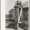 Bell on cattle Ranch near Spur, Texas. This is used to awake the cowboys in the morning, call them to the ranch house telephone, and announce meals