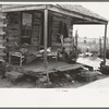 Front porch of tenant farmer's house near Warner, Oklahoma