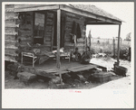 Front porch of tenant farmer's house near Warner, Oklahoma