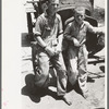 Sons of agricultural day laborer after washing up for dinner, near Webber Falls, Muskogee County, Oklahoma
