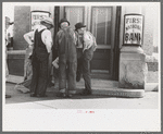 Men in front of bank, Frederick, Oklahoma