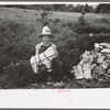 Child of itinerant statue maker, Poteau Creek near Spiro. Sequoyah County, Oklahoma