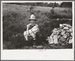 Child of itinerant statue maker, Poteau Creek near Spiro. Sequoyah County, Oklahoma