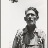 Veteran migrant agricultural worker. He has followed the road for about thirty years. When asked where his home was he said, "It's all over." He was camped in Wagoner County, Oklahoma