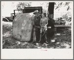 Veteran migrant agricultural worker with his daughter camped on Arkansas River, Wagon County, Oklahoma