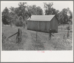 Home of agricultural day laborer near Sallisaw, Oklahoma. Notice absence of windows. Sequoyah County, Oklahoma