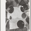 White migrant family eating lunch of blackberry pie on the highway, Muskogee County, east of Fort Gibson, Oklahoma