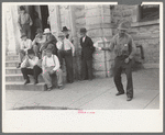 Group of residents of Weatherford, Texas, listening to politician speak