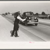 Hitchhiker at city limits of Waco, Texas
