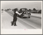 Hitchhiker at city limits of Waco, Texas