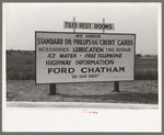 Sign showing various services rendered by service station. Waco, Texas