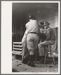 Group of men at poultry cooperative, Brownwood, Tex