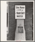 Sign at laundry, Brownwood, Texas. Most towns in west Texas have hard gypsum water
