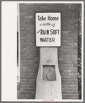 Sign at laundry, Brownwood, Texas. Most towns in west Texas have hard gypsum water