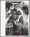 Saleswoman at grocery store. Waco, Texas