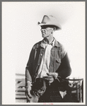 Cattleman at stockyard, San Angelo, Texas