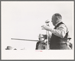 Auctioneer at horse sale. El Dorado, Texas