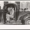 Waiting to unload cans of raw milk at creamery, San Angelo, Texas