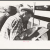 Checker at stockyards. San Angelo, Texas