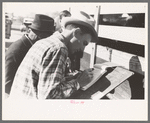 Checker at stockyards. San Angelo, Texas